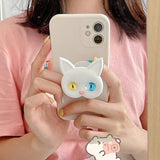 3D Cat Phone Holder Griptok - Mobile AccessoriesA handmade 3D cat-shaped phone holder grip designed for iPhone users. It offers: A secure, anti-drop grip for everyday use Stylish and charming design that adds personality to your device Versatility for scrolling, selfies, videos, and even home or car decor  Perfect for upgrading your phone accessories with both function and flair. Let me know if you'd like this adapted for a product listing or ad!