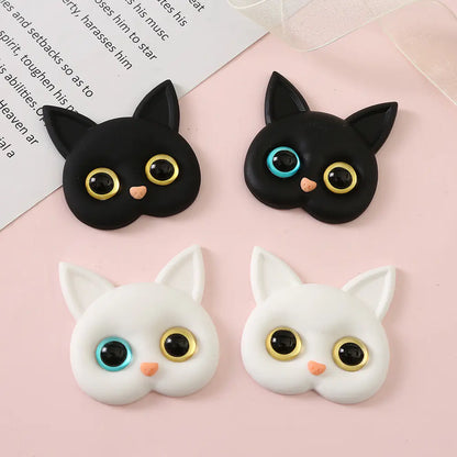 3D Cat Phone Holder Griptok - Mobile AccessoriesA handmade 3D cat-shaped phone holder grip designed for iPhone users. It offers: A secure, anti-drop grip for everyday use Stylish and charming design that adds personality to your device Versatility for scrolling, selfies, videos, and even home or car decor  Perfect for upgrading your phone accessories with both function and flair. Let me know if you&