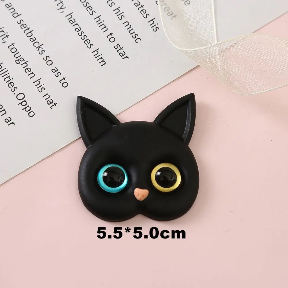 3D Cat Phone Holder Griptok - Mobile AccessoriesA handmade 3D cat-shaped phone holder grip designed for iPhone users. It offers: A secure, anti-drop grip for everyday use Stylish and charming design that adds personality to your device Versatility for scrolling, selfies, videos, and even home or car decor  Perfect for upgrading your phone accessories with both function and flair. Let me know if you&