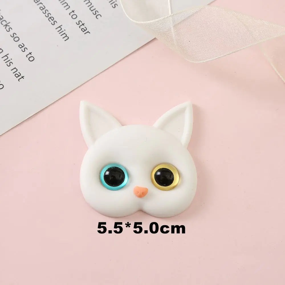3D Cat Phone Holder Griptok - Mobile AccessoriesA handmade 3D cat-shaped phone holder grip designed for iPhone users. It offers: A secure, anti-drop grip for everyday use Stylish and charming design that adds personality to your device Versatility for scrolling, selfies, videos, and even home or car decor  Perfect for upgrading your phone accessories with both function and flair. Let me know if you&