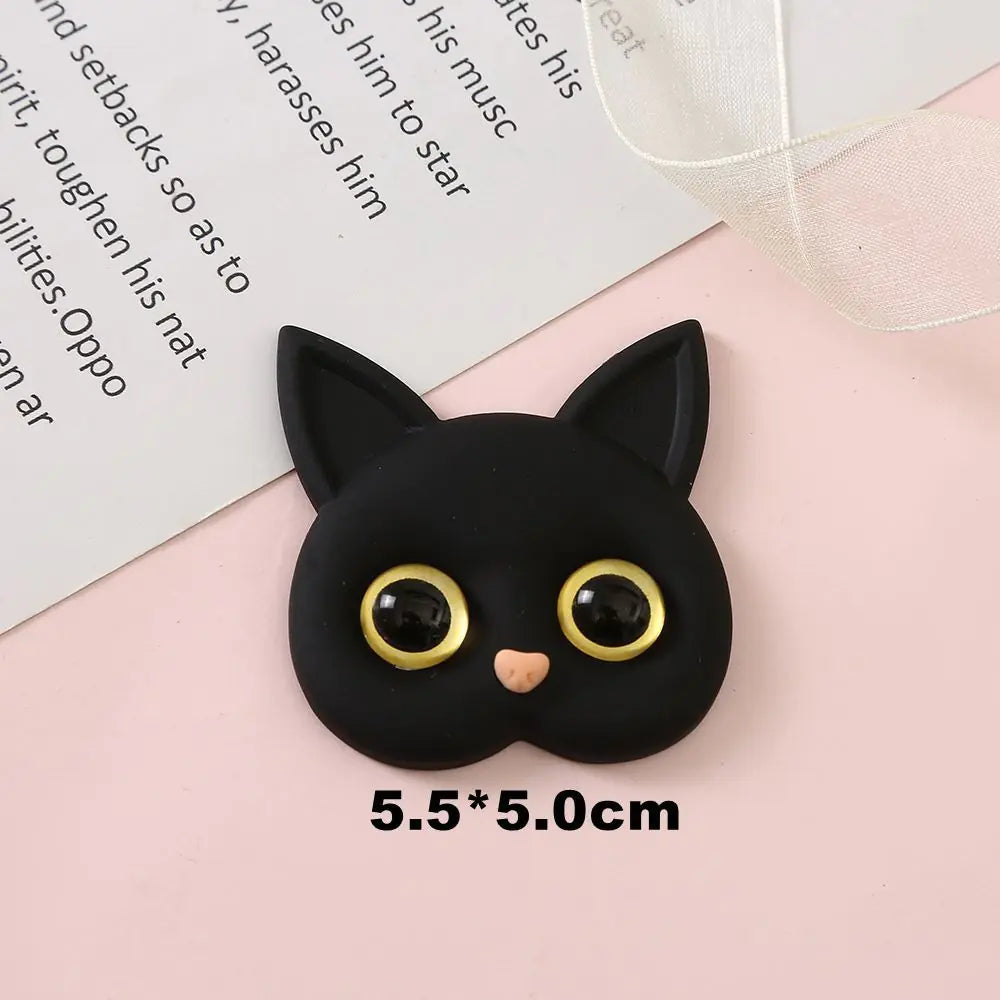 3D Cat Phone Holder Griptok - Mobile AccessoriesA handmade 3D cat-shaped phone holder grip designed for iPhone users. It offers: A secure, anti-drop grip for everyday use Stylish and charming design that adds personality to your device Versatility for scrolling, selfies, videos, and even home or car decor  Perfect for upgrading your phone accessories with both function and flair. Let me know if you&