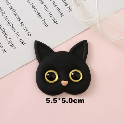 3D Cat Phone Holder Griptok - Mobile AccessoriesA handmade 3D cat-shaped phone holder grip designed for iPhone users. It offers: A secure, anti-drop grip for everyday use Stylish and charming design that adds personality to your device Versatility for scrolling, selfies, videos, and even home or car decor  Perfect for upgrading your phone accessories with both function and flair. Let me know if you&